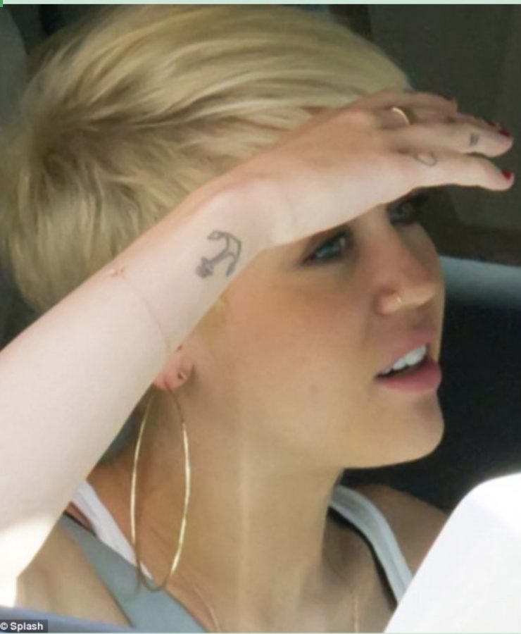 Tattoos: The Meaning Behind Mileys