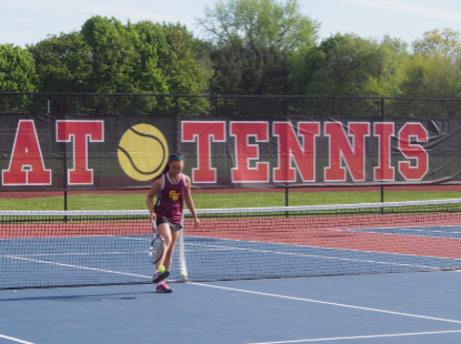 Caitlin Sze working hard during a match.