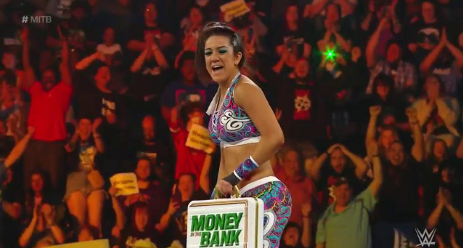 Bayley at the top of the ladder after becoming Ms. Money in the Bank