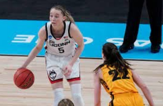 Paige Beckers from Uconn faces off against Iowa’s, Catlin Clark in NCAA Womens College basketball tournament