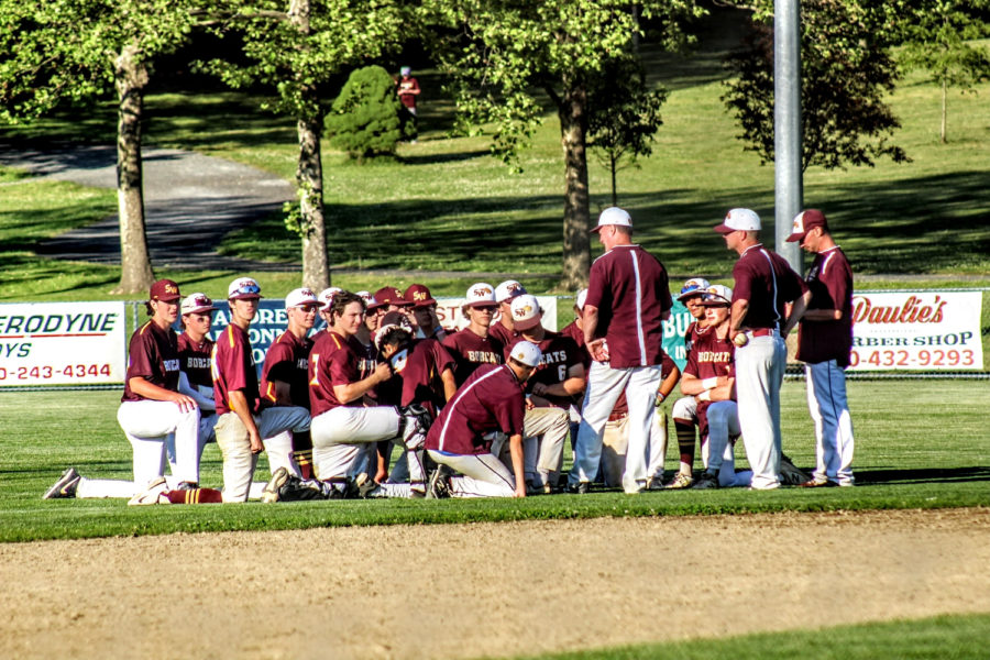 The South Windsor High School baseball team meets together after defeating Hamden.