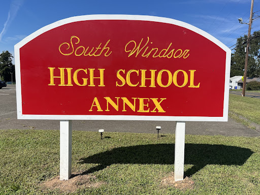 The South Windsor High School Annex place in front of the building welcoming students