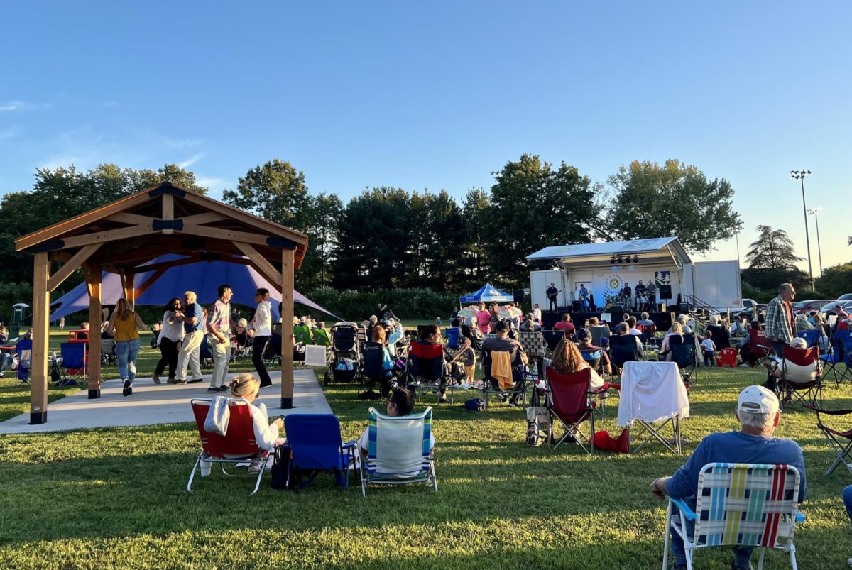 South Windsor Community members enjoying the Savage Brothers performance while in their lawn chairs.
