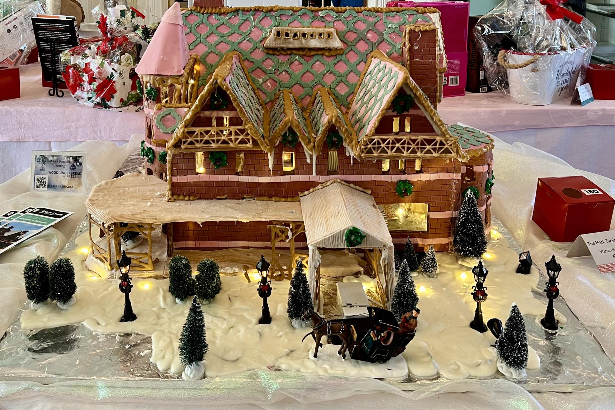 Award winning gingerbread house created by South Windsor resident sits at the entrance of the display.
