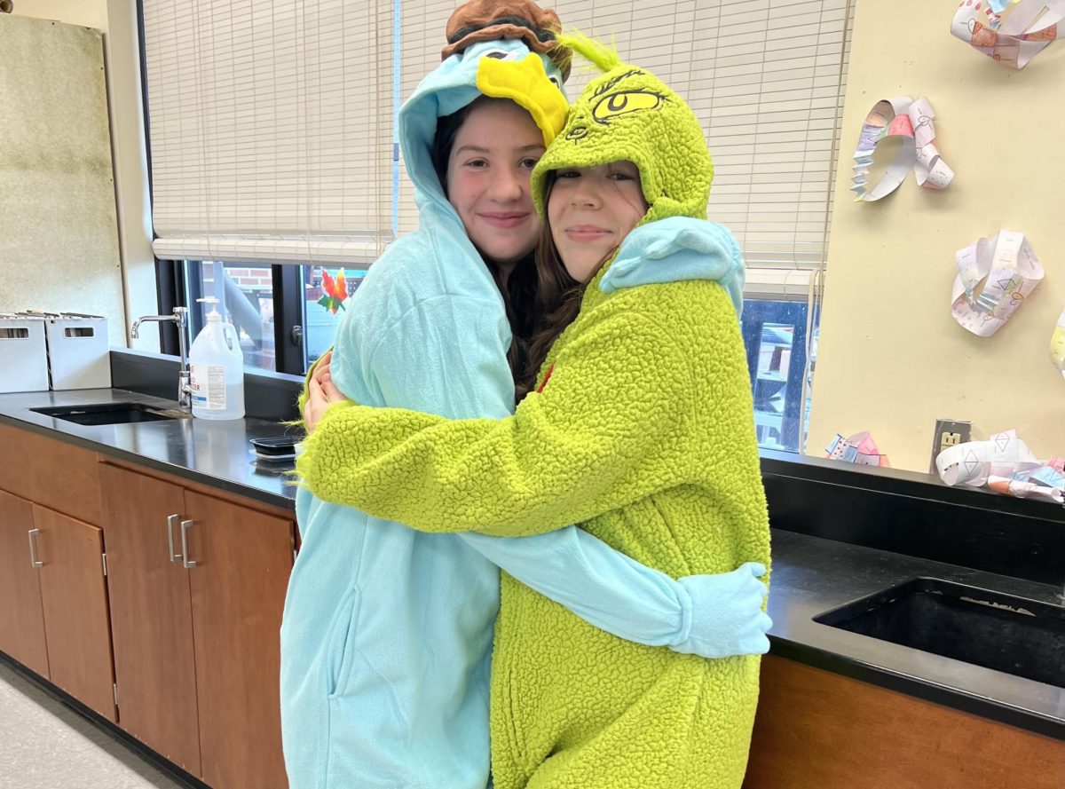 Students from Ms. Swans sophomore winning homeroom in their onesies on the first annual SWHS pj day.