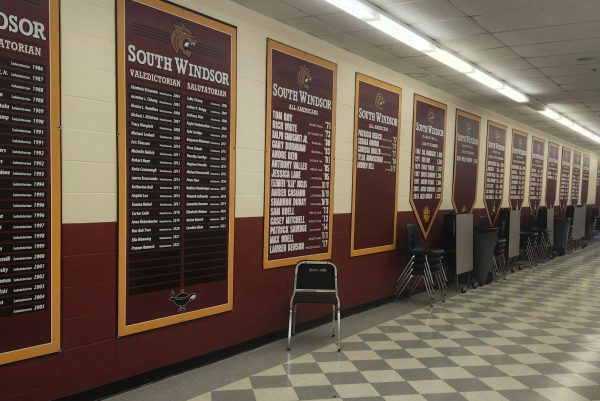Picture of an empty Hall of Achievement displaying athletic records.