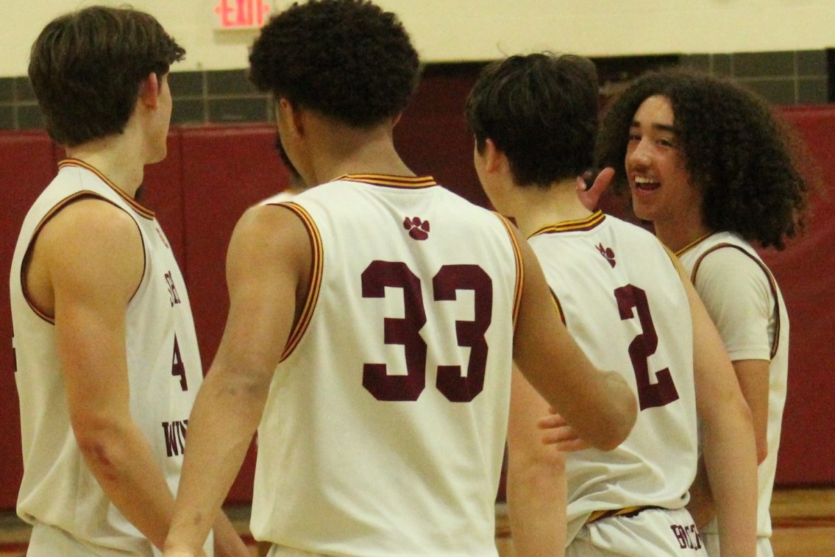 Bobcats+celebrate+their+57-41+win+against+Tolland+in+Mondays+game.