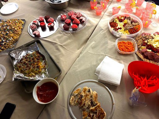 The diverse foods that were prepared and served by the many groups.