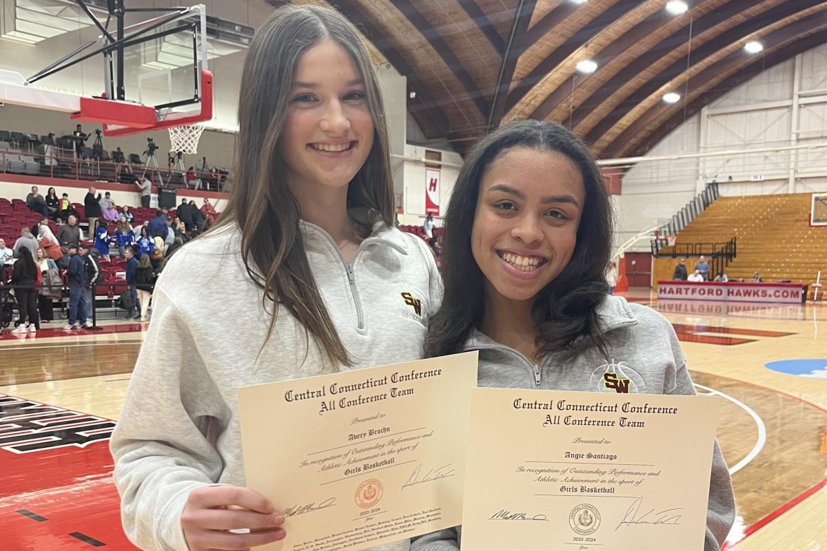 Sophomore Avery Brochu and Junior Angie Santiago celebrate their awards at the CCC All Conference award ceremony.