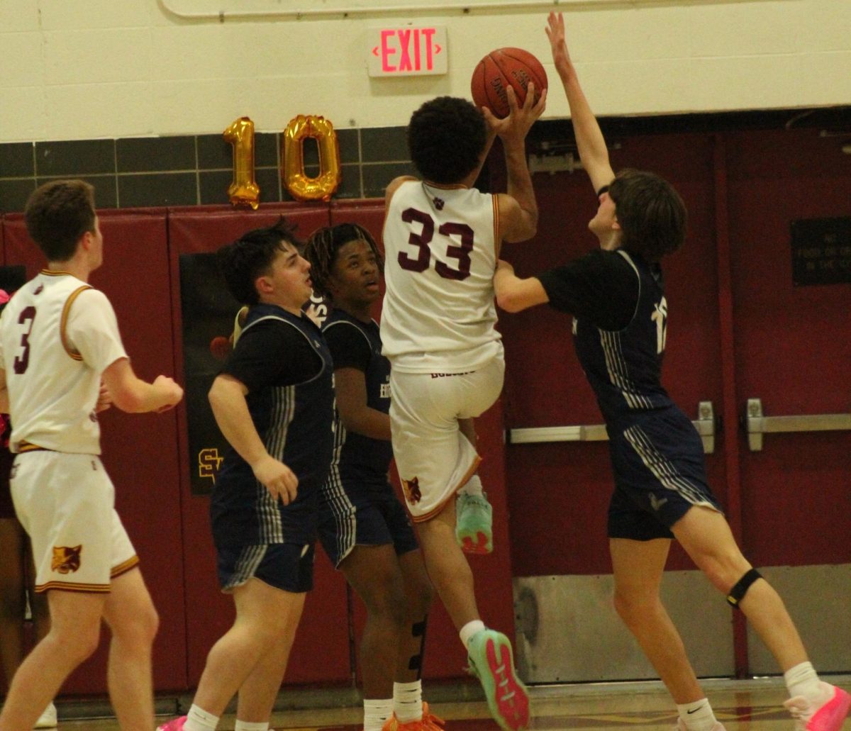 Junior Tyler Pottinger goes up for a layup in the Bobcats 51-47 win over Bristol Eastern.