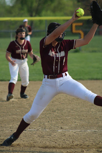 Gabby Ryan pitches a fastball to strike out the batter. 
