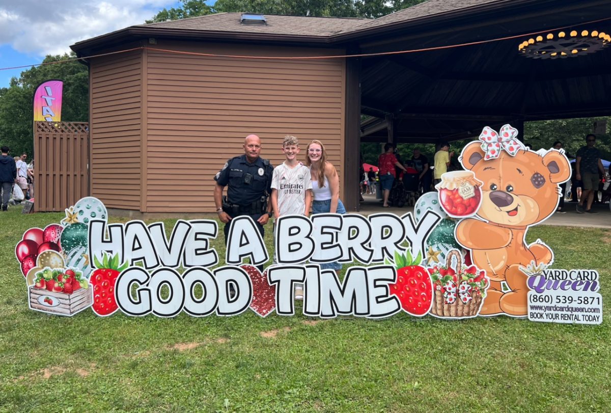 South Windsor residents pose for a photo while attending the 42nd Annual Strawberry Festival