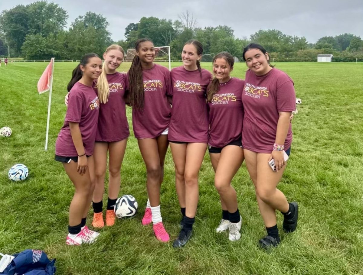 The varsity seniors pose for a photo during the preseason jamboree. 