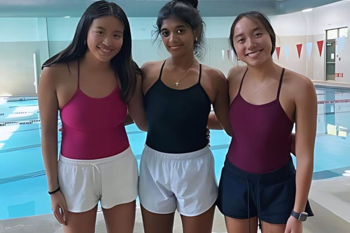 Audrey Zhang, Trisha Dalavi, and Alyssa Nguyen, getting ready for their upcoming swim season.