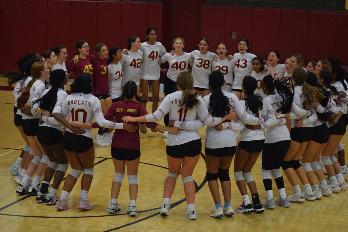 Girls Volleyball celebrates their 3-0 win against Platt on Thursday, September 12th. 