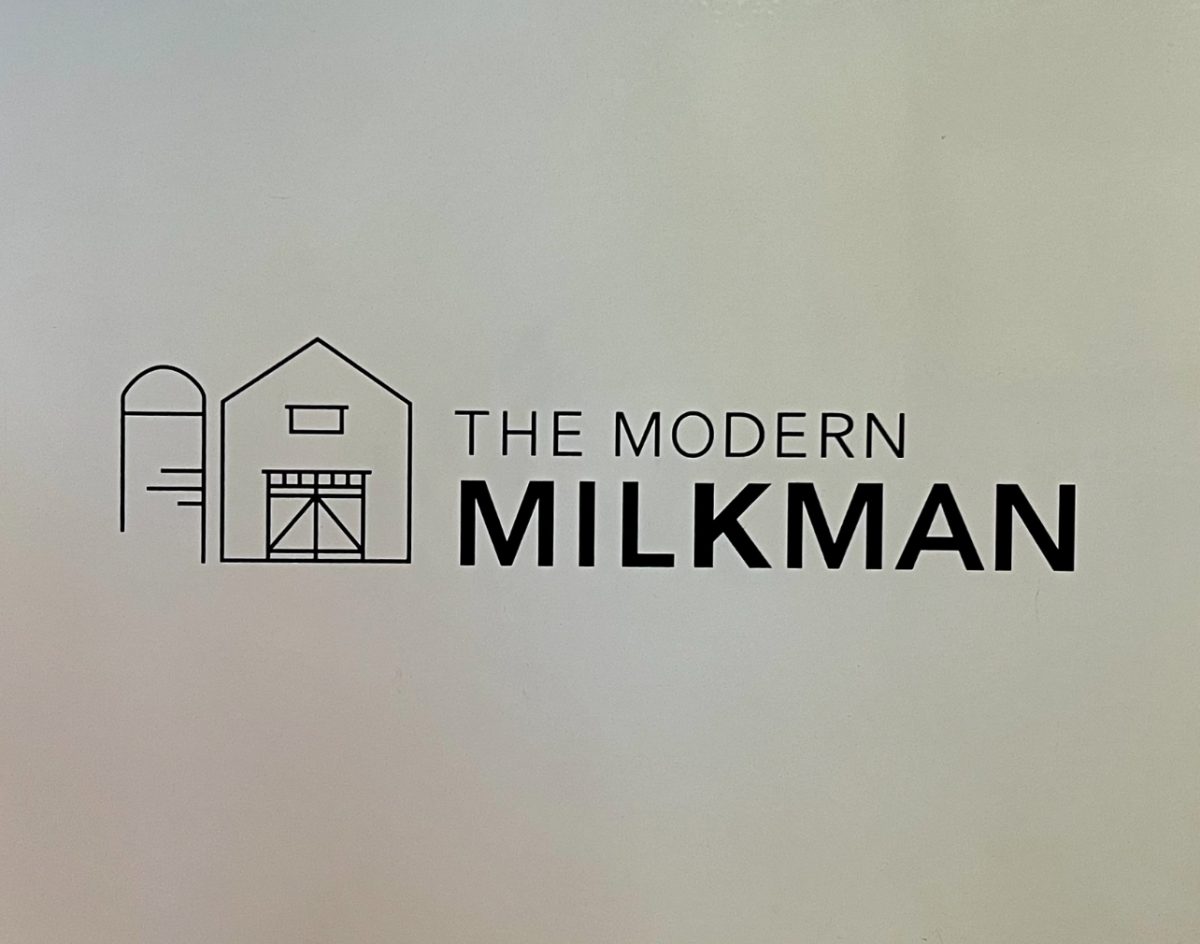 The Modern Milkman logo printed on a company cooler used to store delivered products.