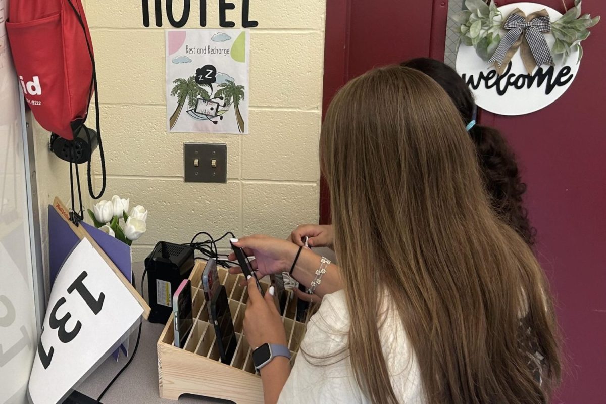 South Windsor High School students turning in their cell phones 