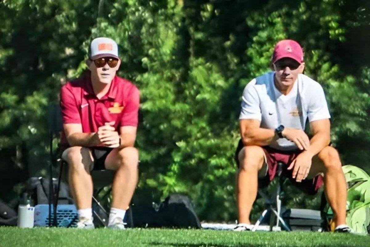 Varsity coaches Lepak and Jeff scouting SWHS boys soccer game.