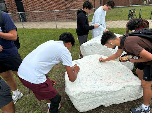 The seniors of South Windsor High School signed both rocks during their lunch waves.