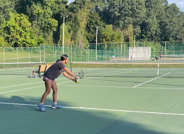 A tennis player participating in the charity tournament at South Windsor High School. (Akhil Shunmugaraja)