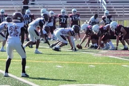 The South Windsor High School freshman football team at the line of scrimmage. 