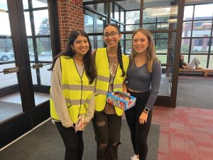 Members of the SADD Club pose for a picture during their airheads campaign to promote safe driving.