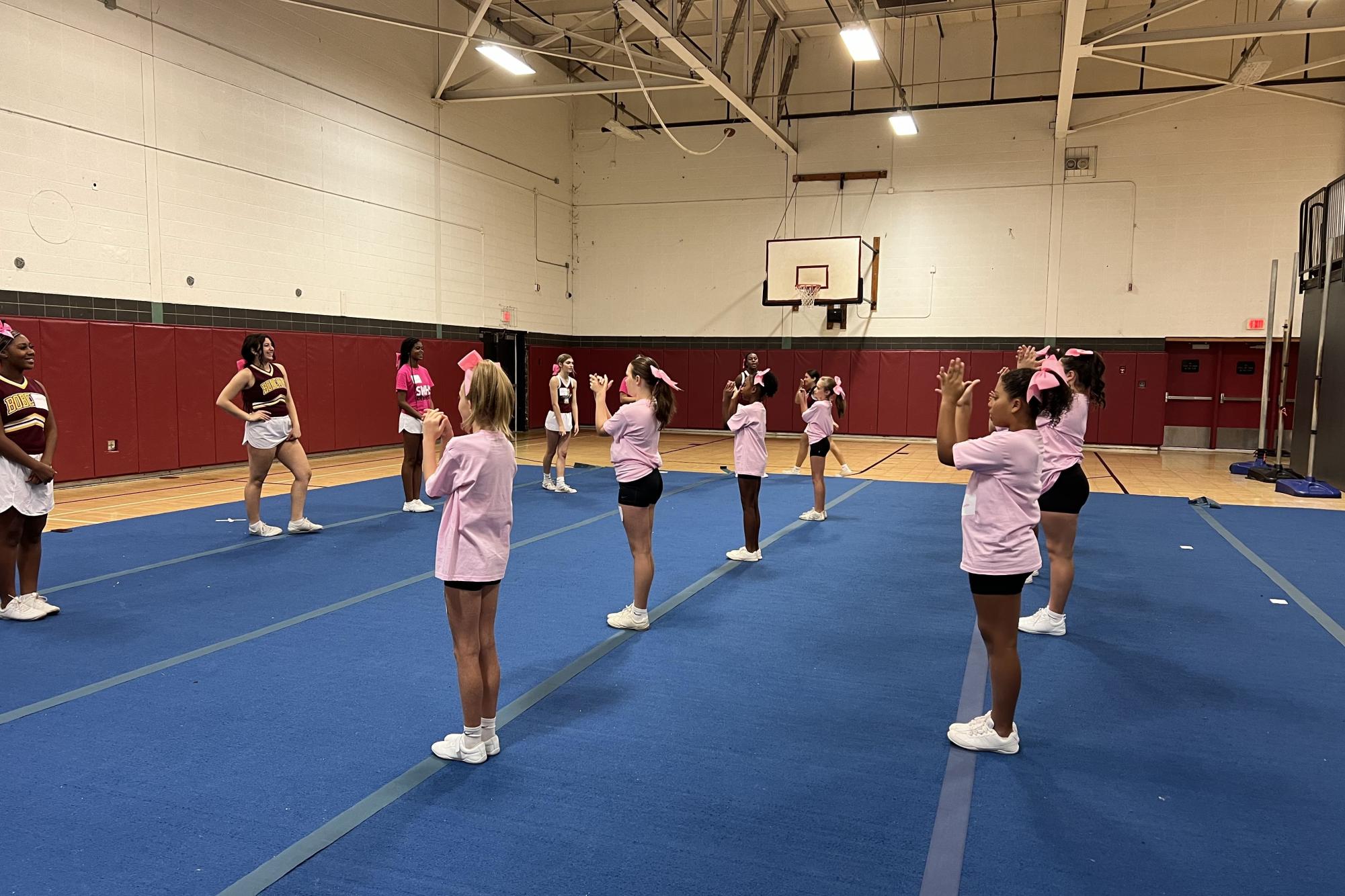 Cheerleaders Kick Off Season with Camp and Community Events