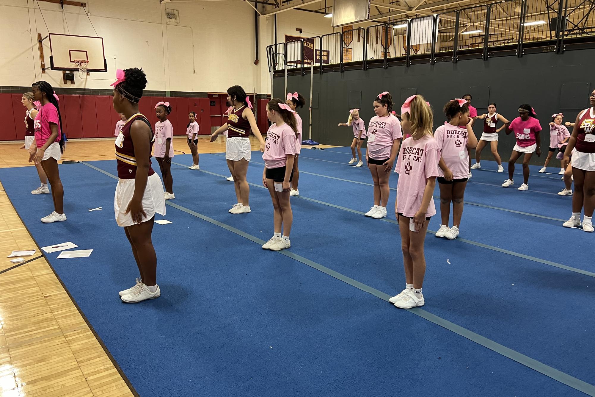 Cheerleaders Kick Off Season with Camp and Community Events