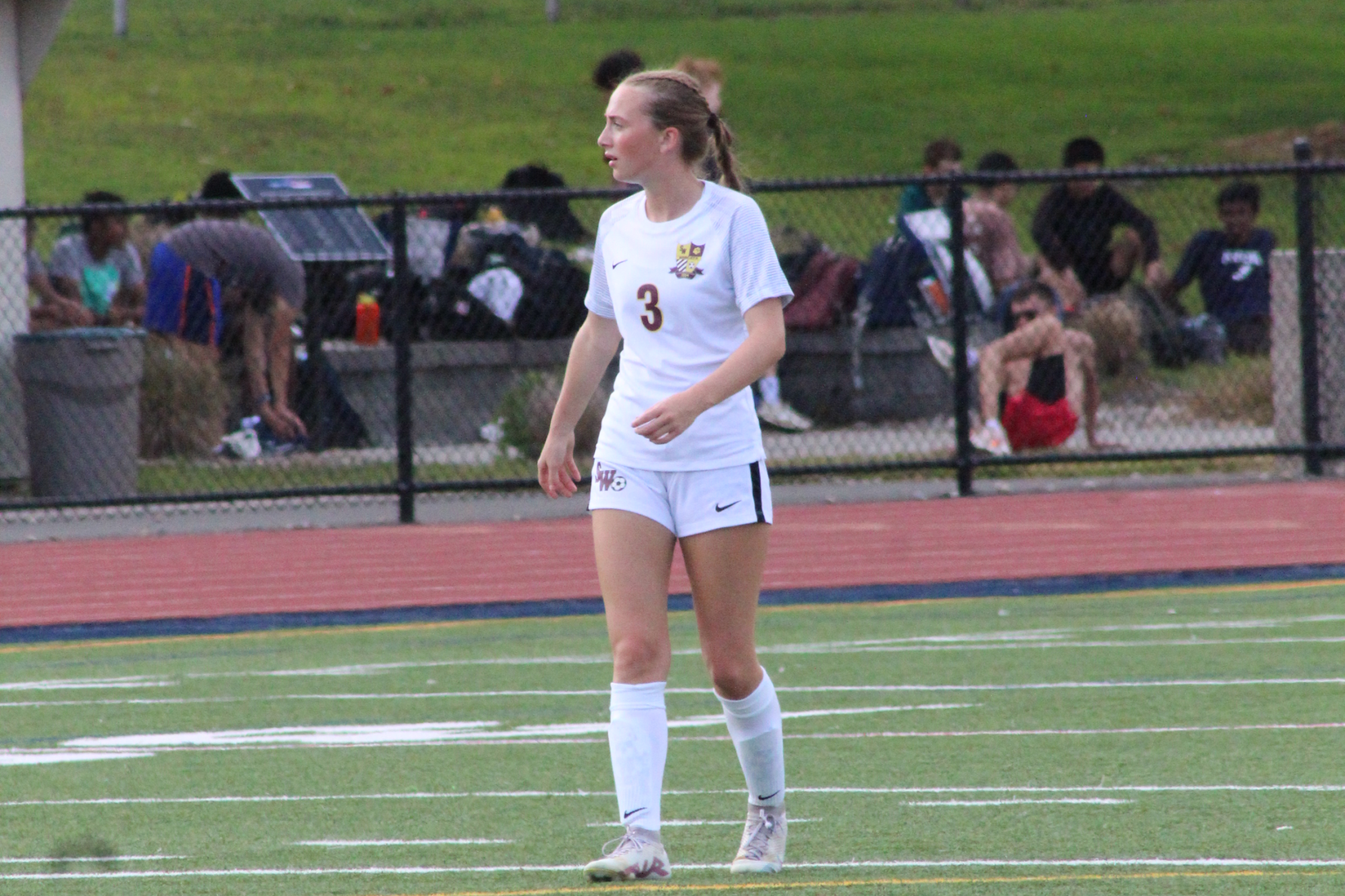 Junior center back Erin Martin on the field during the girls game against Avon. 