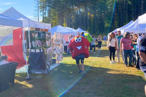 The Apple Fest mascot made an appearance at the fair for children to take photos with and give hi-fives.