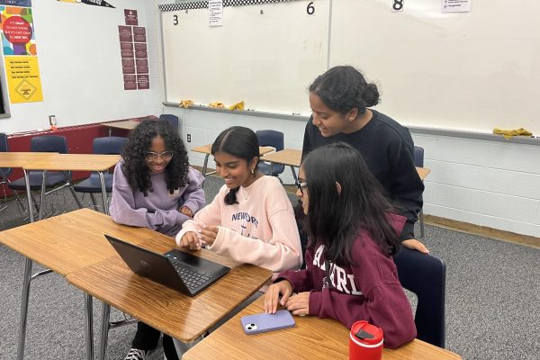 Organizers of the Vision Club, sophomores Dhanya Sanakkayala,  Alveena Suha, Levina Jerald and Disha Hosamani meeting to put together plans for their next meeting's speaker. 
