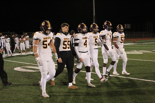 SWHS senior captains walk onto the field for the coin toss.