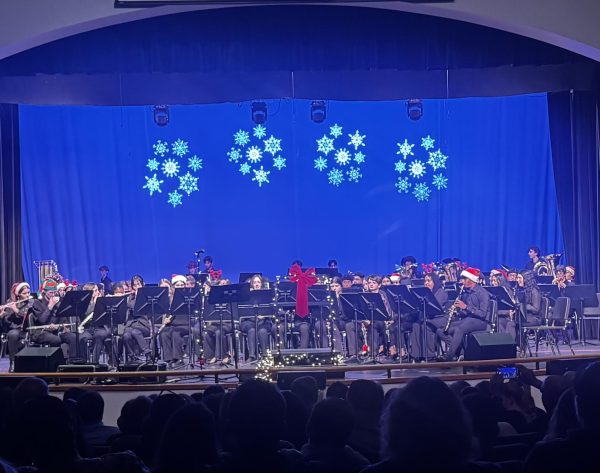 The South Windsor High School Symphonic Band sets the stage, to perform at their winter concert. (Richard Sinclair) 