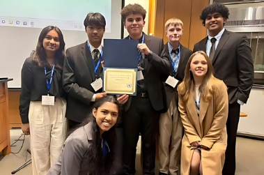 South Windsor High School students presenting their award at the Model UN debate. (Riteesh Ramakrishnan)