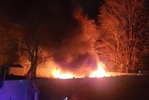 A raging fire breaks out in a South Windsor resident's back yard. (Robin Packi Pendleton)