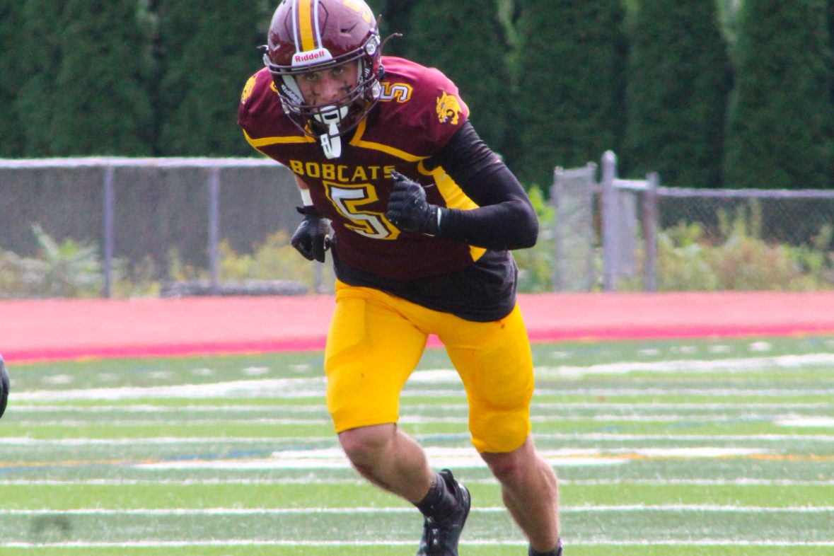 Senior wide receiver Ethan Burke running a route during the 24-25 high school football season.  