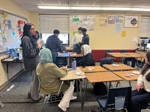 Members of the Islamic Cultural Club holding their February meeting. 