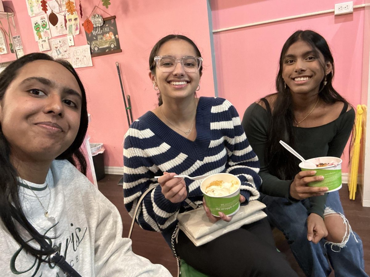 Members of the sophomore class enjoying their frozen treat during their fundraiser at Sweet Frog.