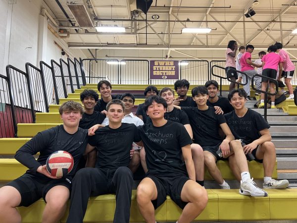 Winners of the volleyball marathon pose for a photo at the end of the event. 