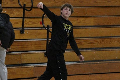 Kevin Wind takes a shot before the Bobcats game against East Hartford.