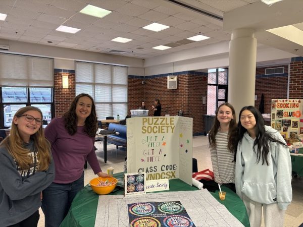 Members of the Puzzle Society at their booth for the Stress Fest. (Andrew Butryman)