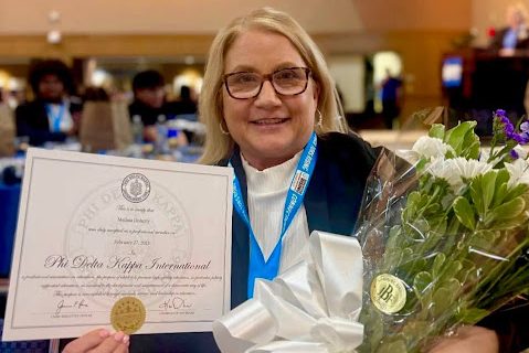 Doherty poses for a photo moments after winning Teacher of the Year (Melissa Doherty)

