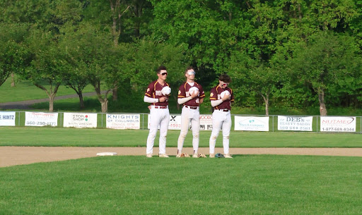 Senior infielders Justin Dittmar, Sam Balducci, and Robert Wunsch stand during the National Anthem before the Bobcats 3-0 win over Valley Regional.