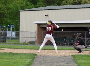Senior Justin Dittmar prepares to hit during the Bobcats 7-3 win over Manchester.