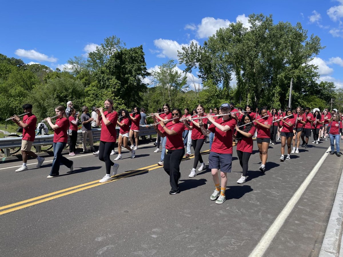 South Windsor High School's marching band walking in the Memorial Day Parade. (Mrs. Quinn)