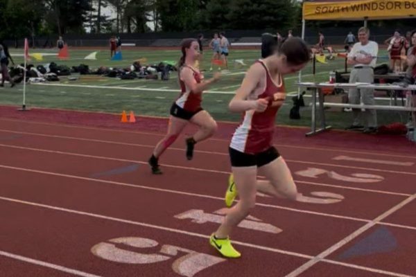 Freshman Juliana Meyer and sophomore Gabriana Knowles cross the finish line in the 200 meter dash. (Photo courtesy of SW track team)