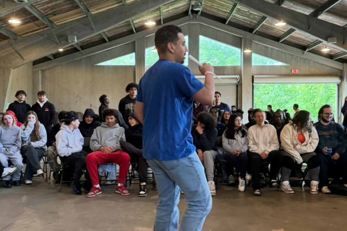 A student performs at the lip sync contest during senior outing at Holiday Hill. 