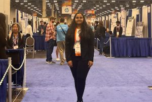 SWHS student Sri Karthik is standing in front of the computational biology and bio informatics at ISEF. (photo courtesy of Sri Karthik)