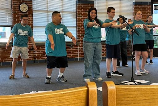 The members of Unified Theater dancing to 'Keep Your Head Up' by Andy Grammar.