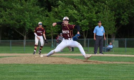 Senior Robert Wunsch delivers a pitch during the Bobcats round one win over Greenwich.